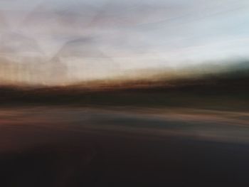 Scenic view of landscape against sky during sunset