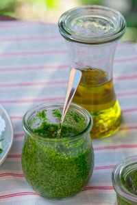 Close-up of drink in glass jar on table