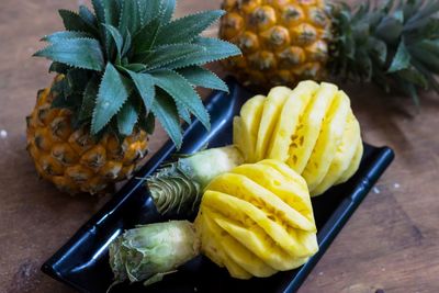 Close-up of fruits in plate on table
