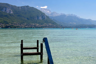 View of sea against mountain range