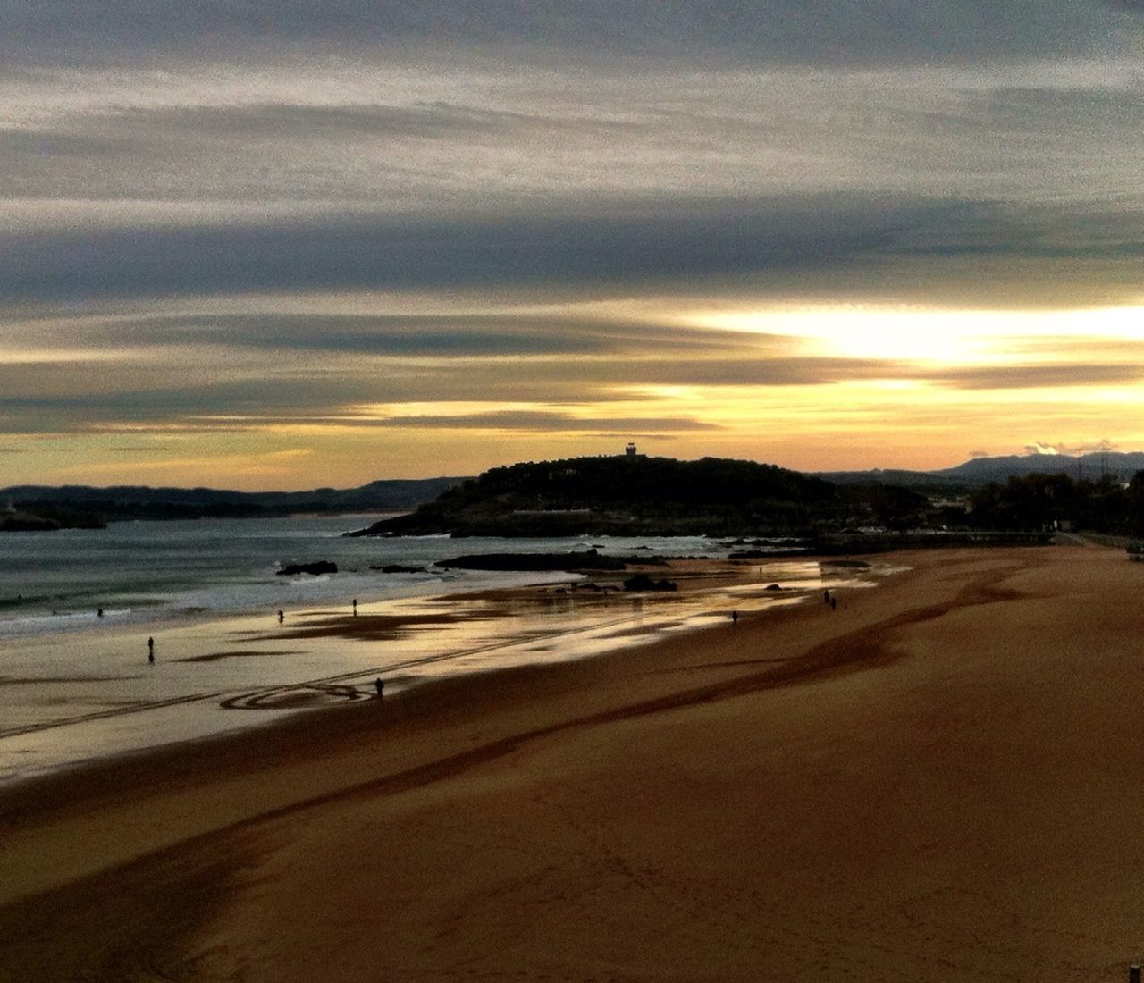 beach, sand, sea, shore, sunset, water, sky, scenics, beauty in nature, tranquil scene, tranquility, horizon over water, coastline, incidental people, nature, cloud - sky, wave, idyllic, vacations, outdoors