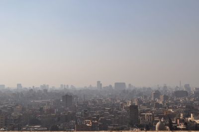 Cityscape against clear sky