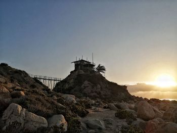 View of rocks against sky during sunset