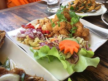 High angle view of food served on table