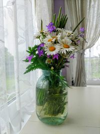 Close-up of flowers in vase