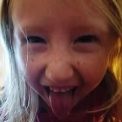 Close-up portrait of smiling girl