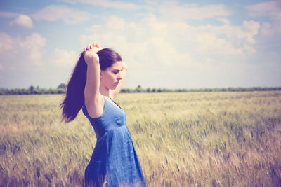 Man standing on grassy field
