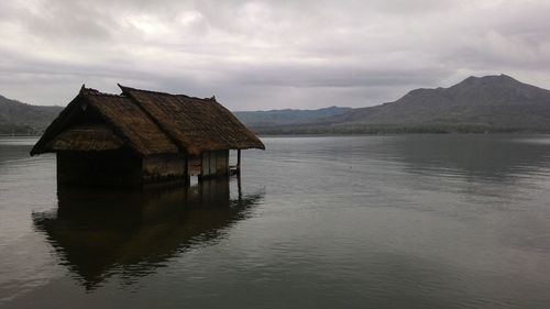 Scenic view of lake with mountains in background