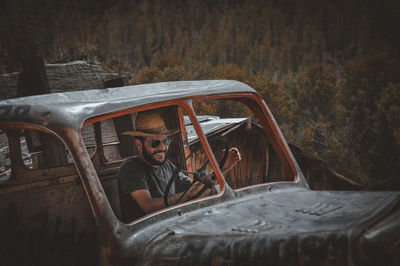 Portrait of man in car