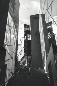 Low angle view of office buildings against sky