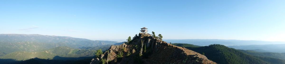 View of mountain range against clear sky