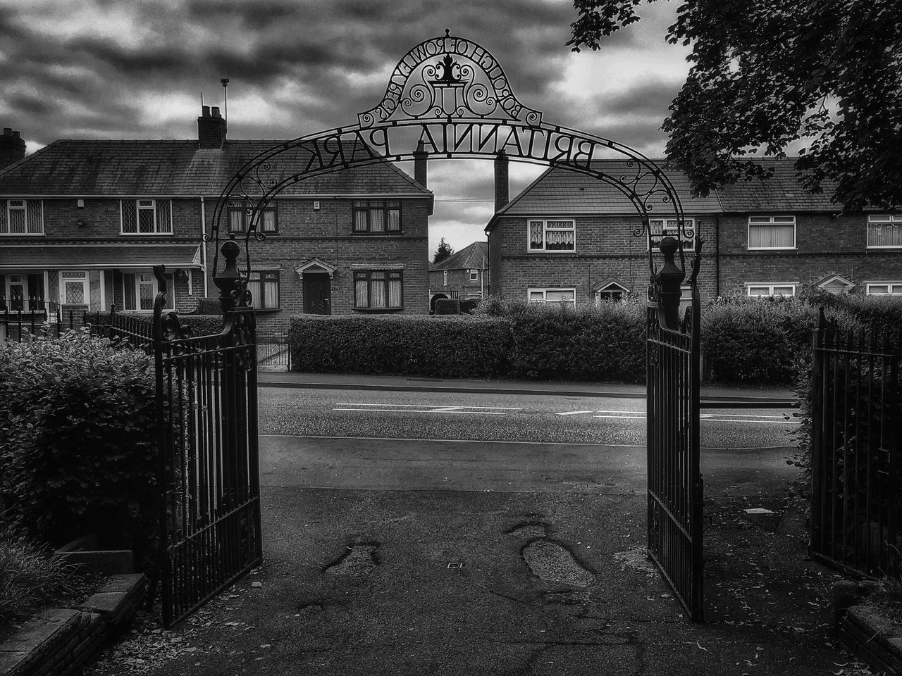 architecture, built structure, building exterior, sky, cloud - sky, tree, cloud, empty, day, house, railing, architectural column, cobblestone, absence, cloudy, outdoors, no people, bench, sunlight, facade