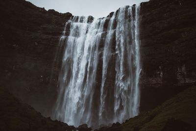 Low angle view of waterfall