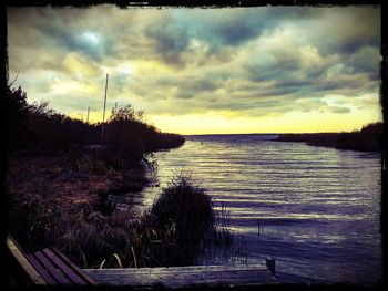 Scenic view of sea against cloudy sky