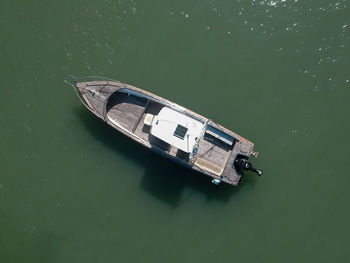 High angle view of boat floating on lake