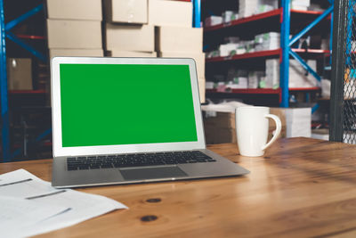 Close-up of laptop on table