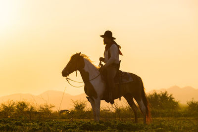 Man riding horse