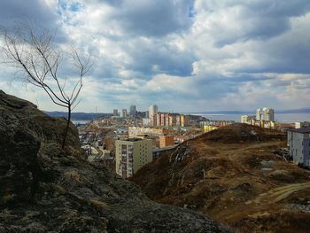 Buildings in city against sky