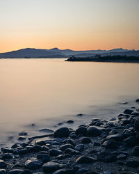 Scenic view of sea against sky during sunset