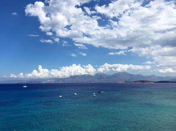 Scenic view of sea against blue sky