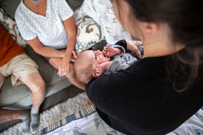 Midsection of couple with hands