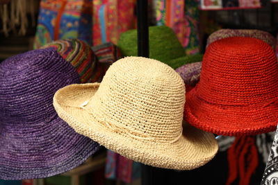 Close-up of hats for sale at market stall