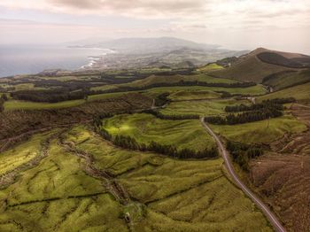 High angle view of farms against sky