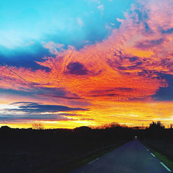 Scenic view of dramatic sky during sunset