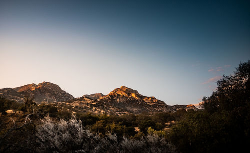 Scenic view of mountains against clear sky