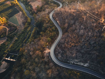 High angle view of winding road in city