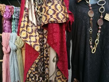 Close-up of clothes hanging for sale in market