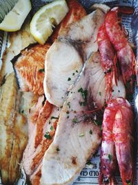 Full frame shot of meat on barbecue grill