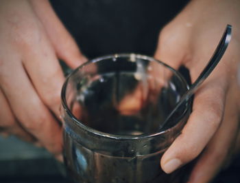 Close-up of person holding drink