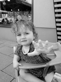 Portrait of cute girl playing