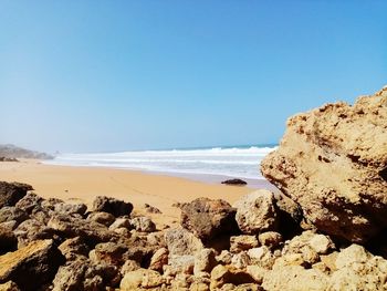 Scenic view of sea against clear sky