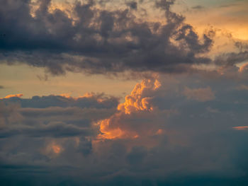 Low angle view of clouds in sky during sunset