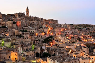 Aerial view of old town against buildings in city