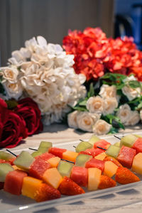 Close-up of roses on table