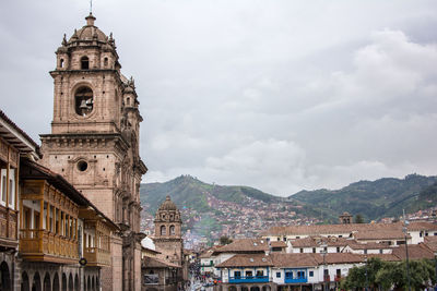 High angle view of buildings in city against sky