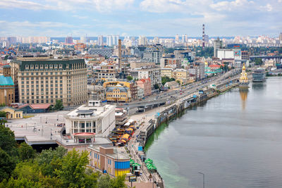 Cityscape of kyiv, view of the river station on the dnipro river and the embankment 