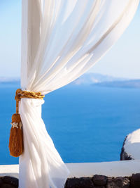 White curtain on terrasse on the island santorini. amazing luxury resort. cyclades, greece.