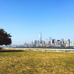 City skyline against blue sky