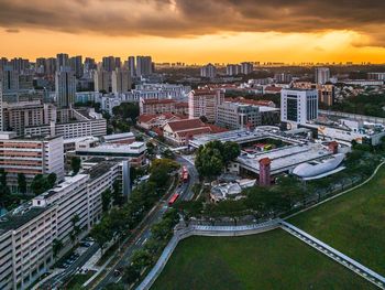 High angle view of buildings against sky during sunset