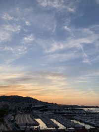 High angle view of buildings against sky during sunset