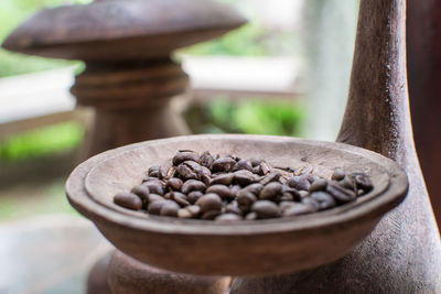 Close-up of coffee beans on table