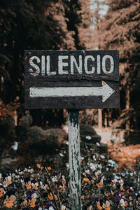 Close-up of signboard in park