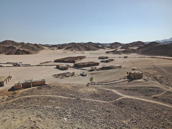 A group of people on quad bikes in the desert of egypt