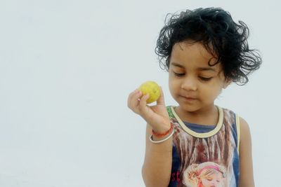 Close-up of a girl holding ice cream