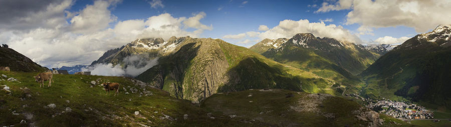 Panoramic view of mountain range against sky