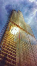 Low angle view of built structure against cloudy sky